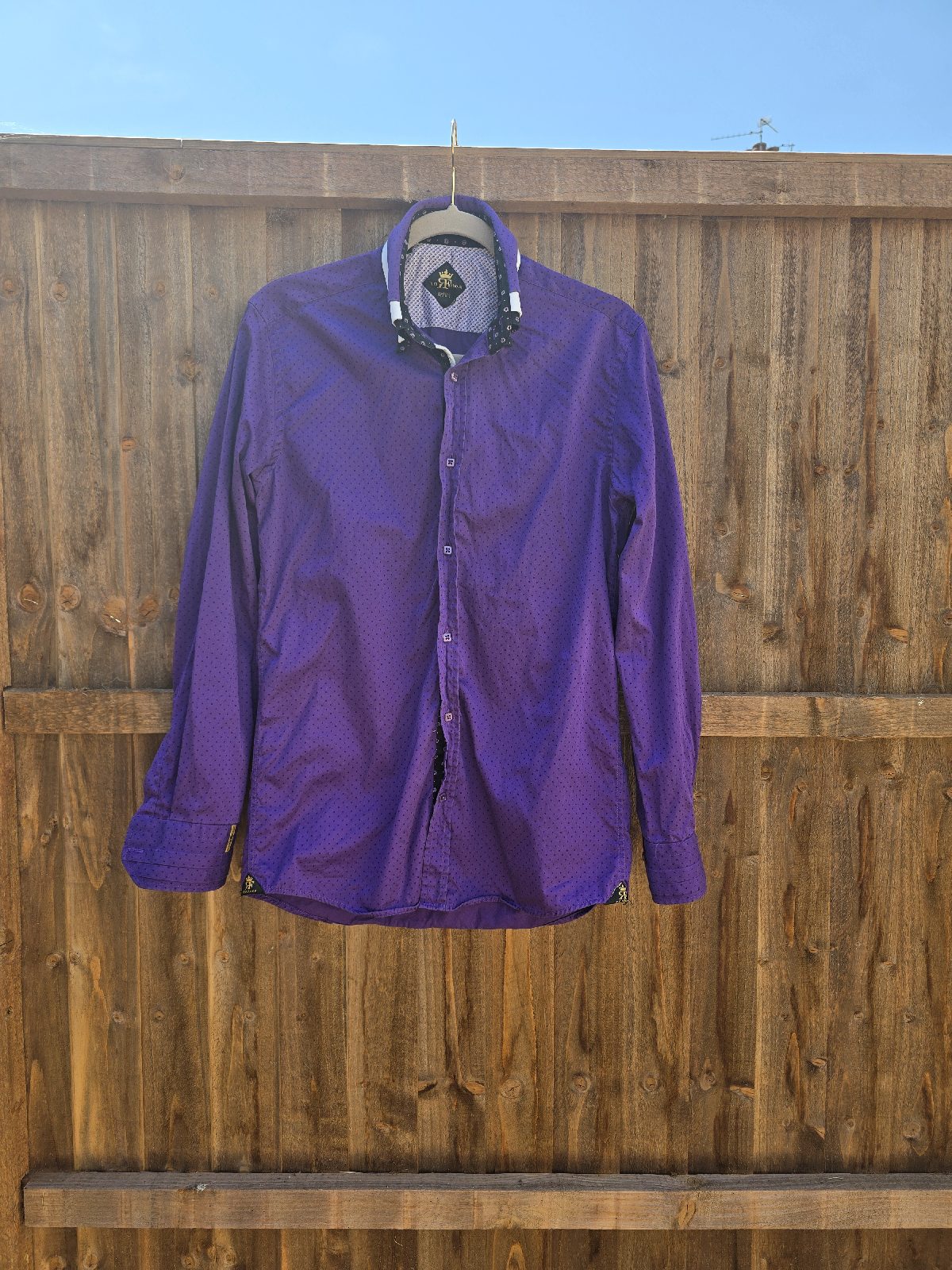 Purple long sleeve shirt.