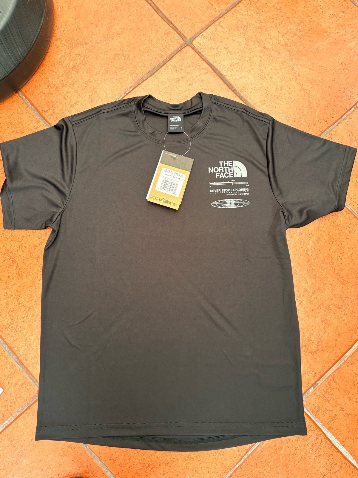 NORTHFACE GRAPHIC REAXION SS TEE HT TNF BLK/SILVER REFLECTIVE