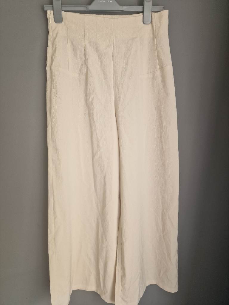 Cream wide leg trousers