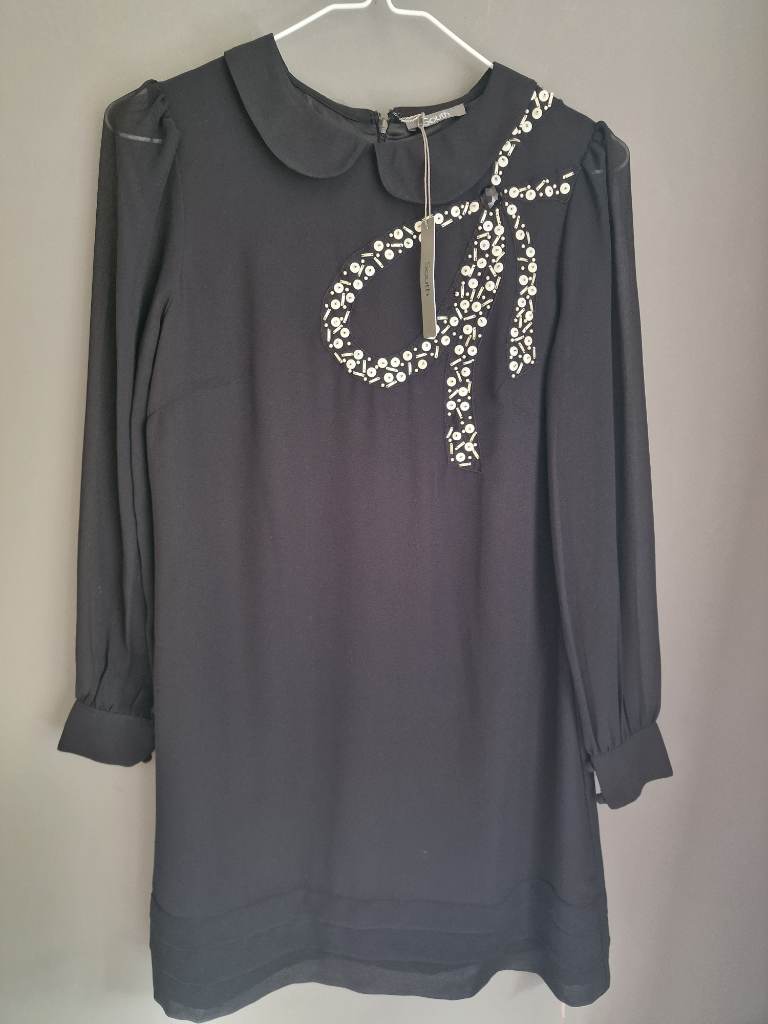Knee length black dress