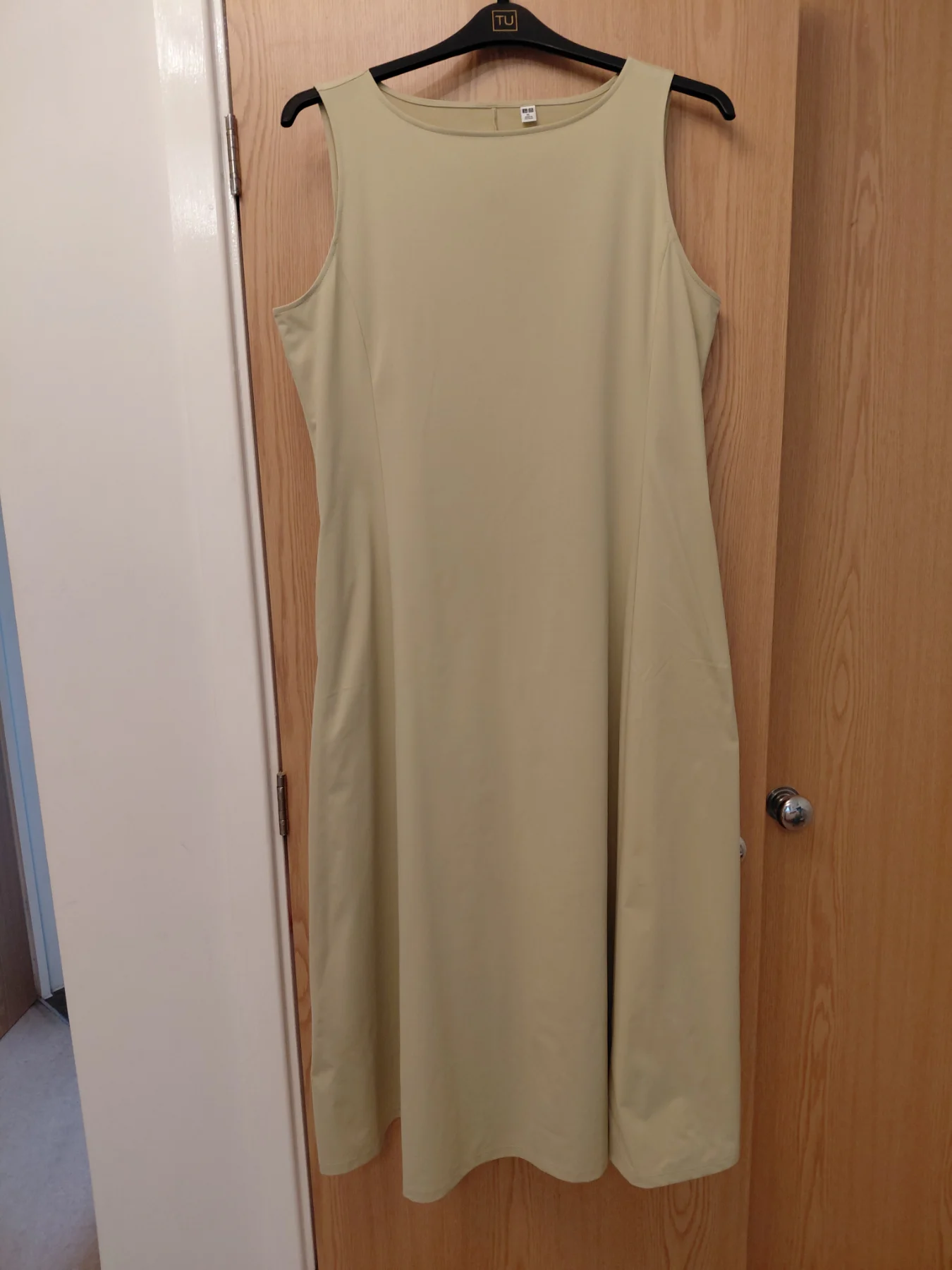 Unique Aline sleeveless dress with pocket ..its a pale limy green