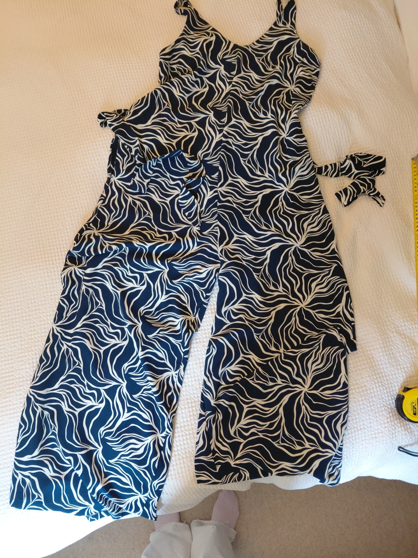 Jumpsuit..lightweight cool.very smart on.