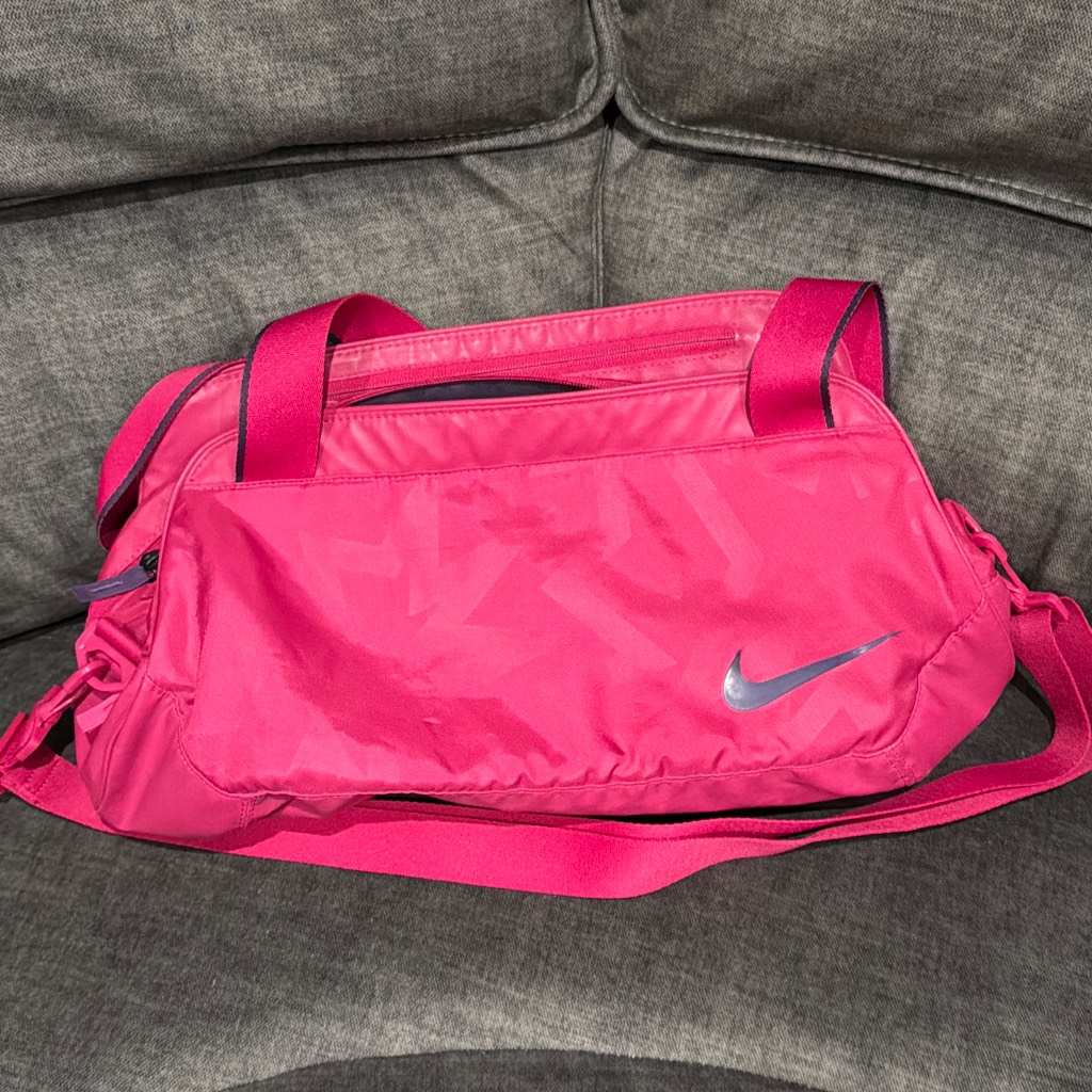Nike women’s bright pink gym duffel bag
