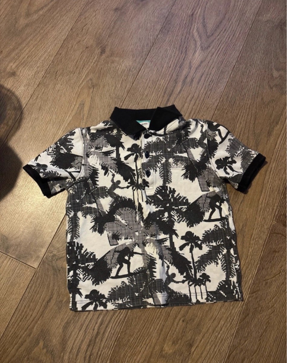 Boys black and white patterned Hugo boss slim fit polo shirt