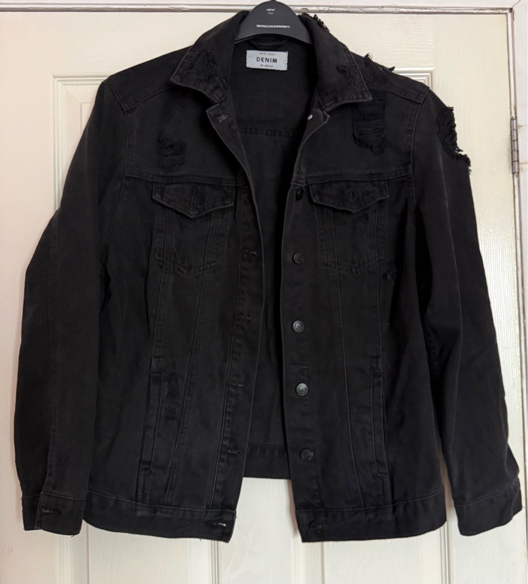 New look size 8 black distressed denim jacket.