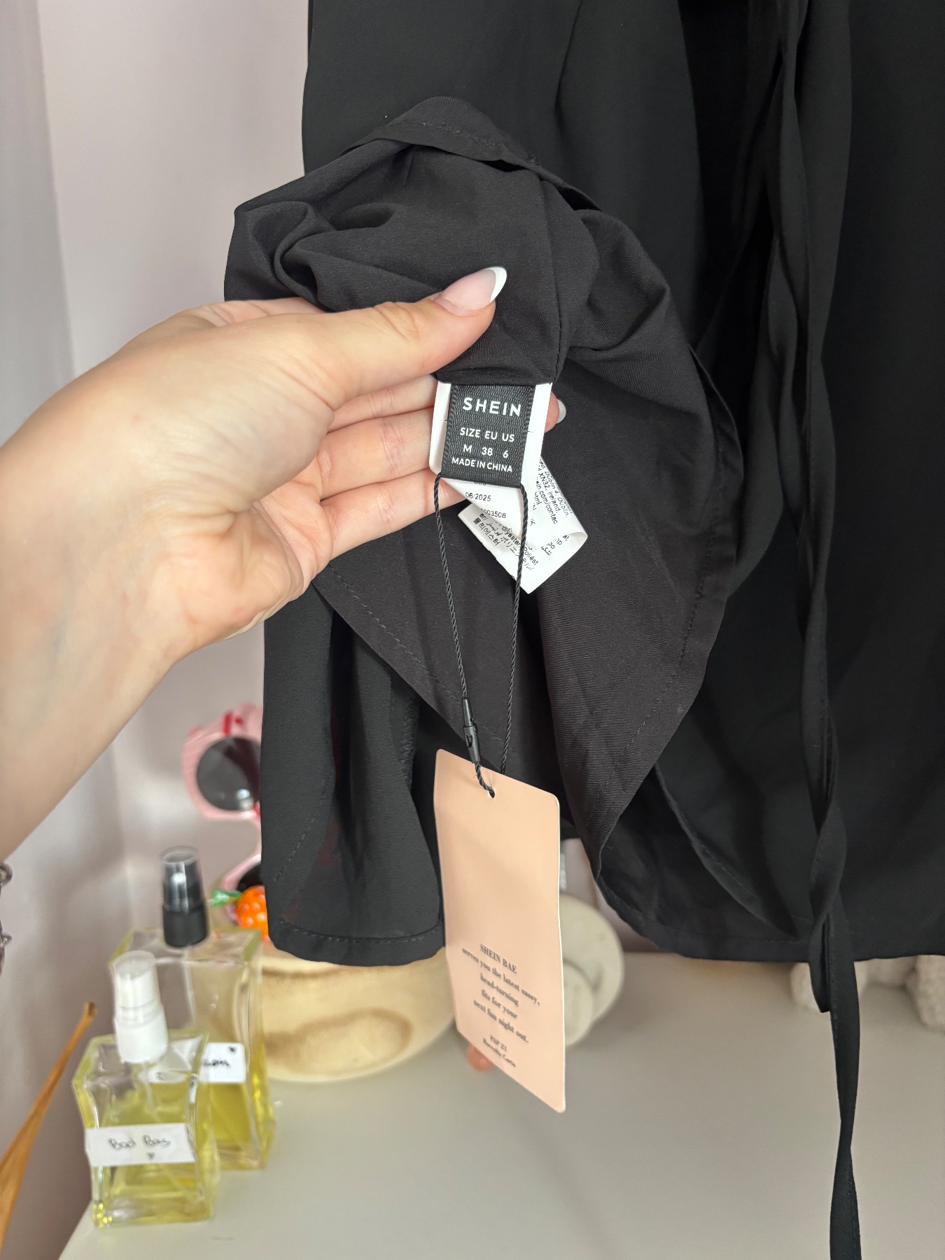 Women’s medium black mini dress with tie back