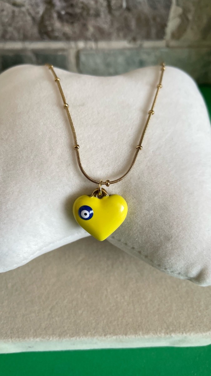 Yellow heart with devil eye pendant necklace