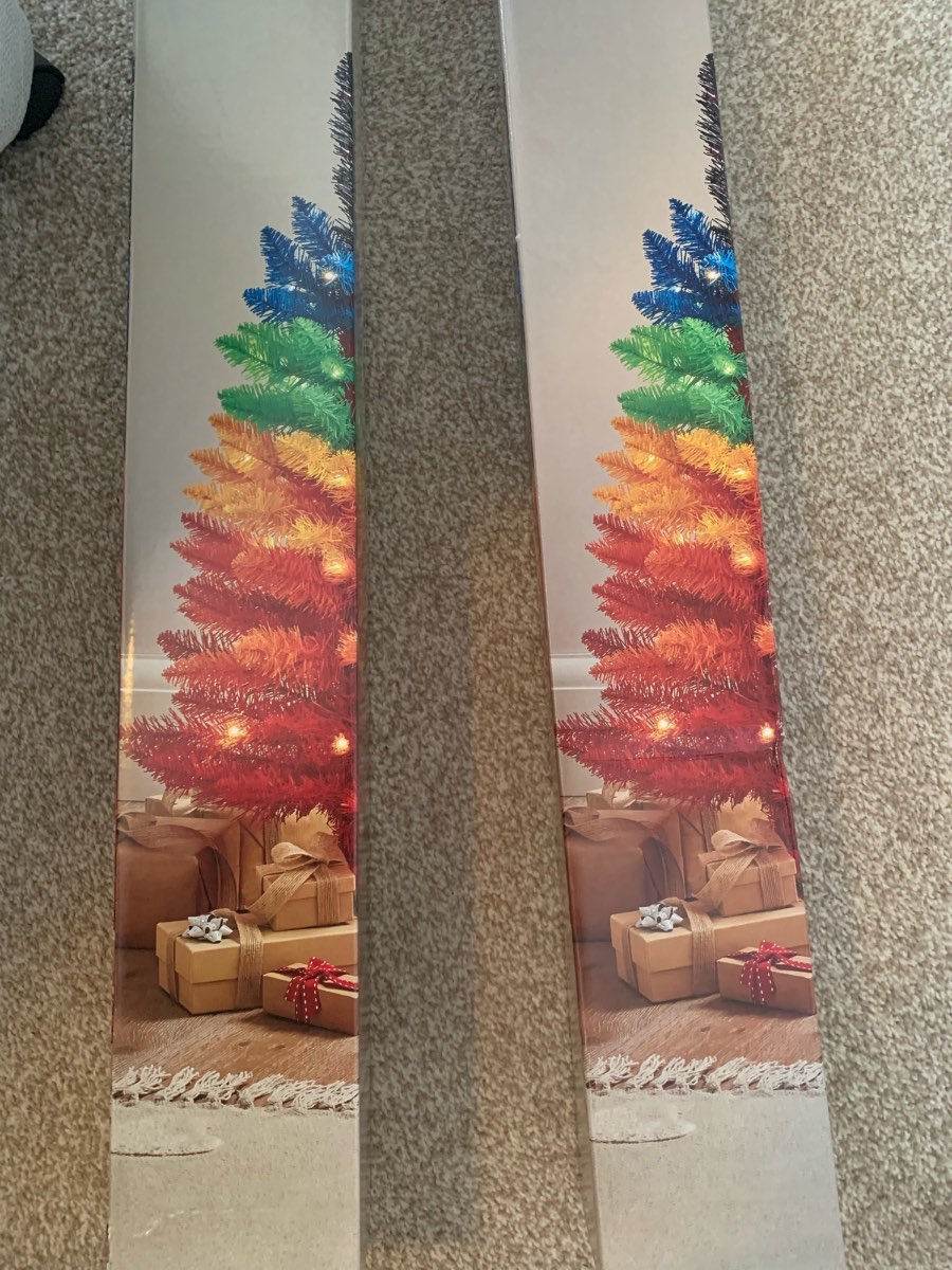 Two rainbow colour light up tree.