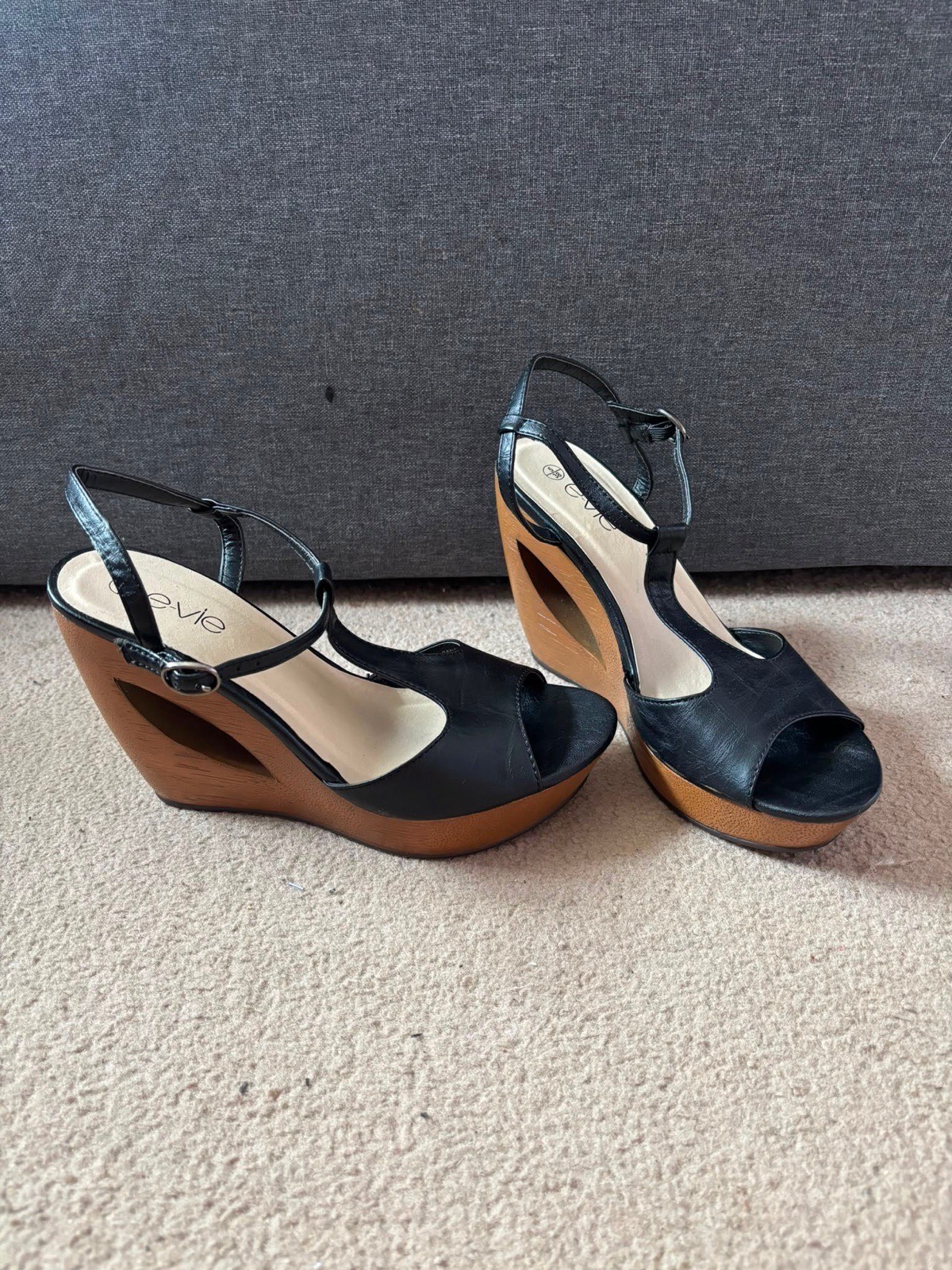 Black leather wedge heels
