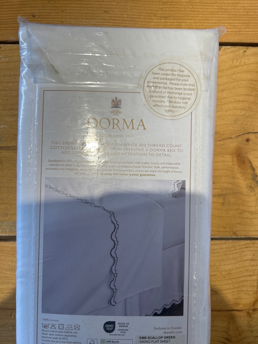 Dorma super King white flat sheet hundred percent Cottonembroidered Scarlett edged green