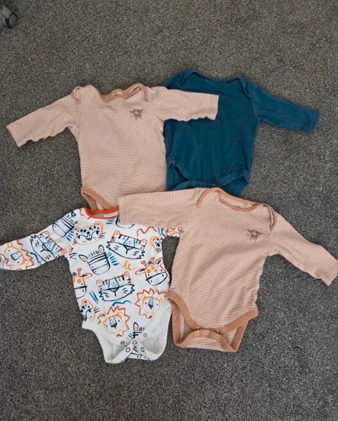 bundle of 4 baby bodysuits