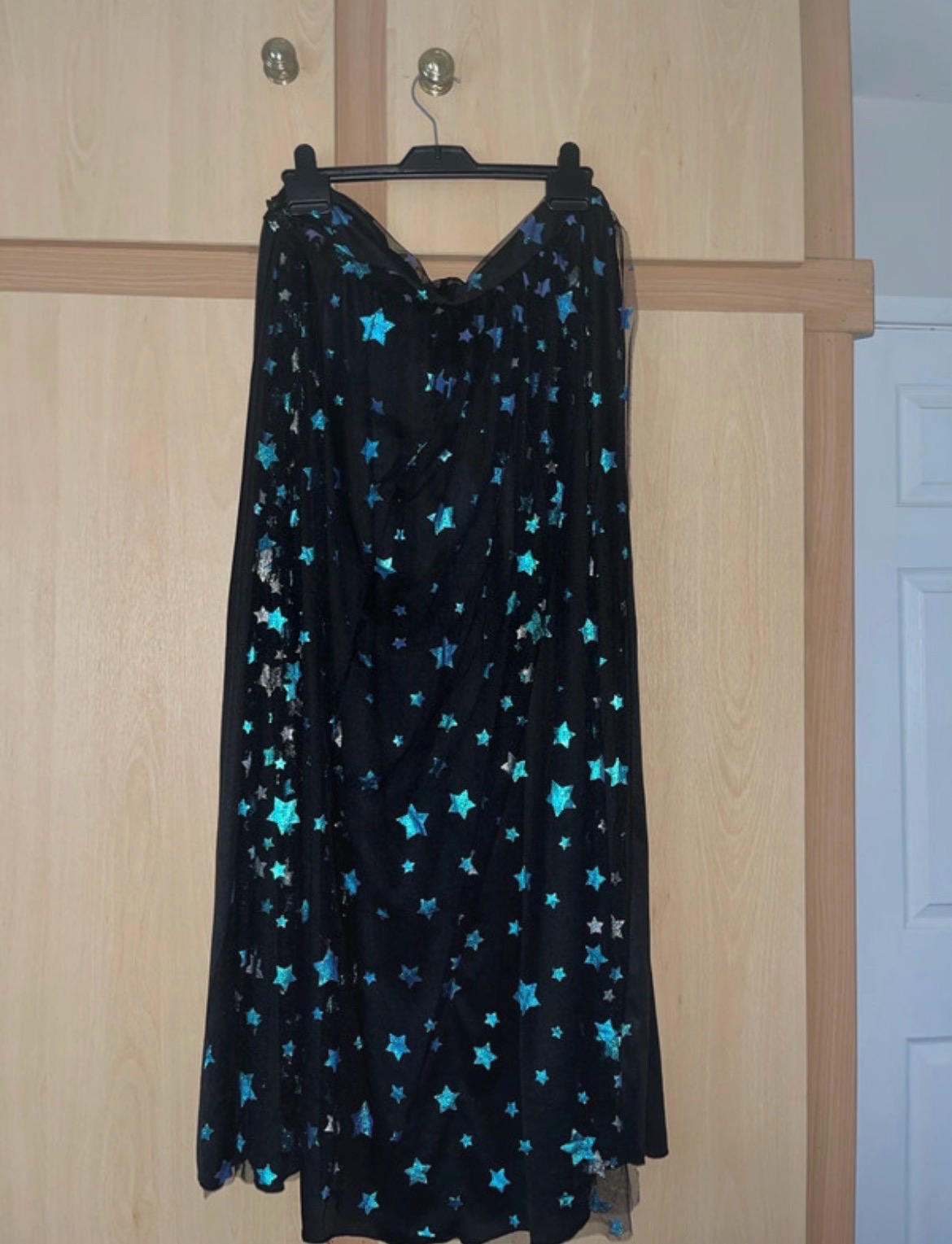 Black and blue mesh cape