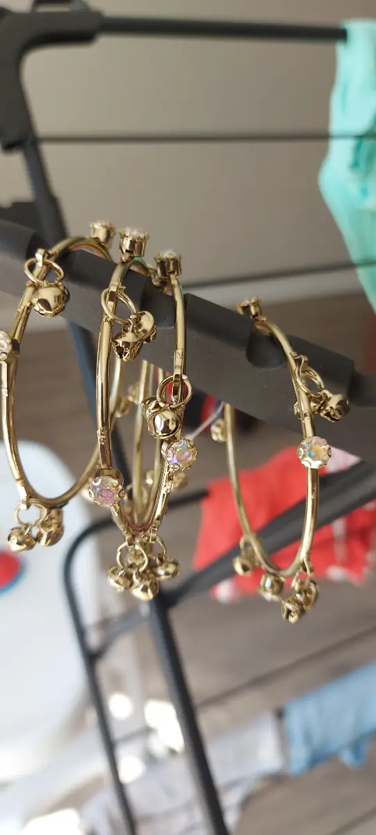 Dangling gold bangles