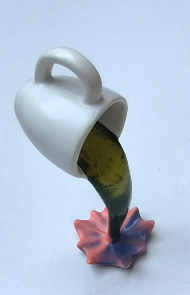 Floating coffee cup sculpture