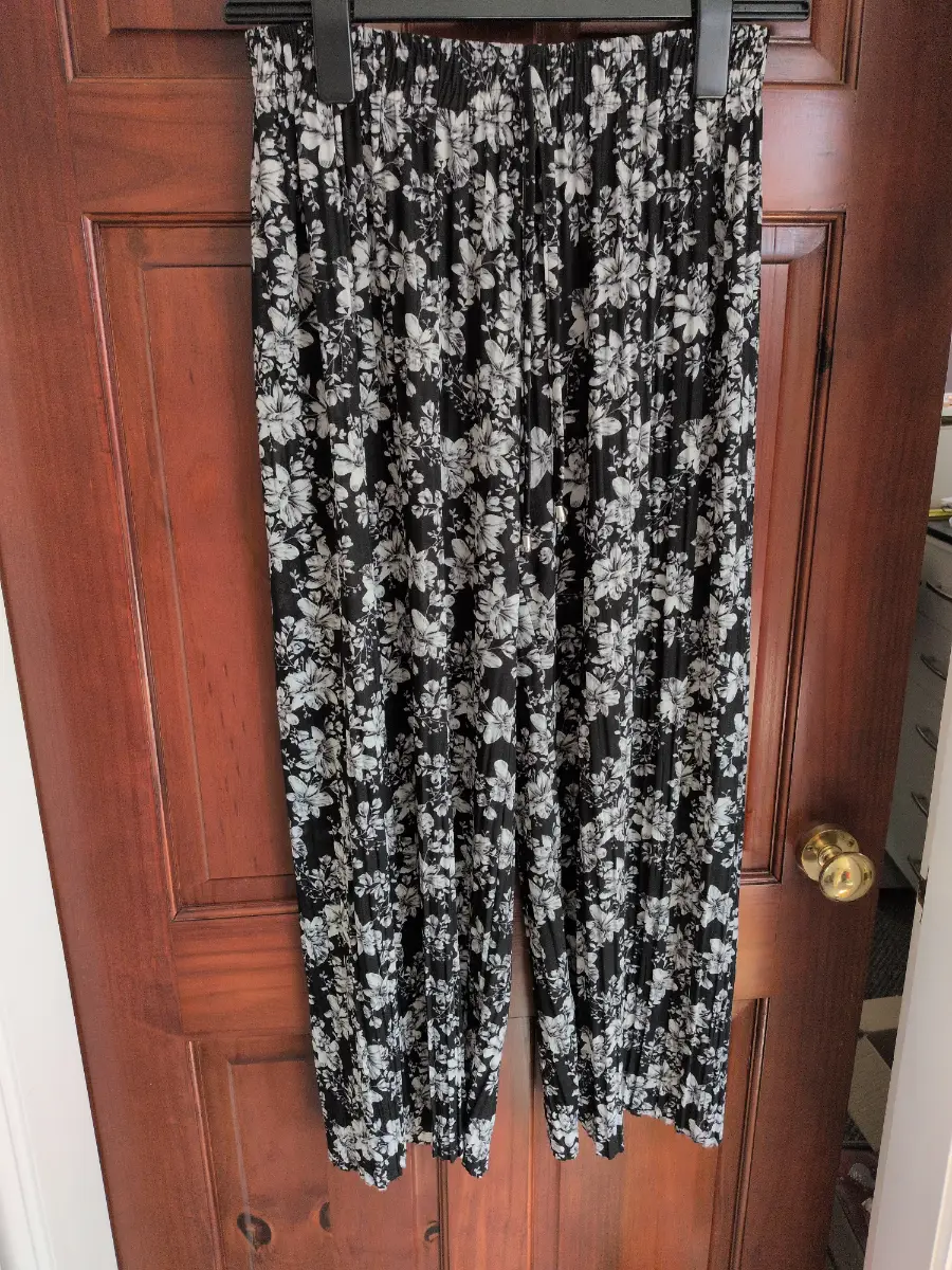 Black floral wide leg trousers size S/M