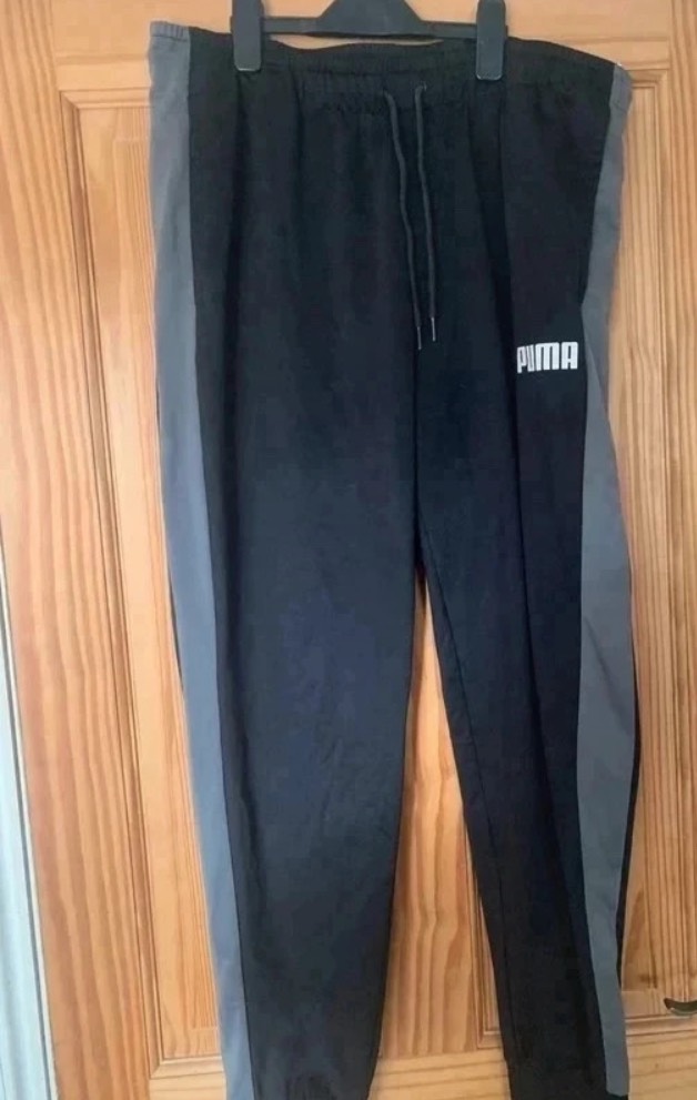 Puma black tracksuit bottoms size XL