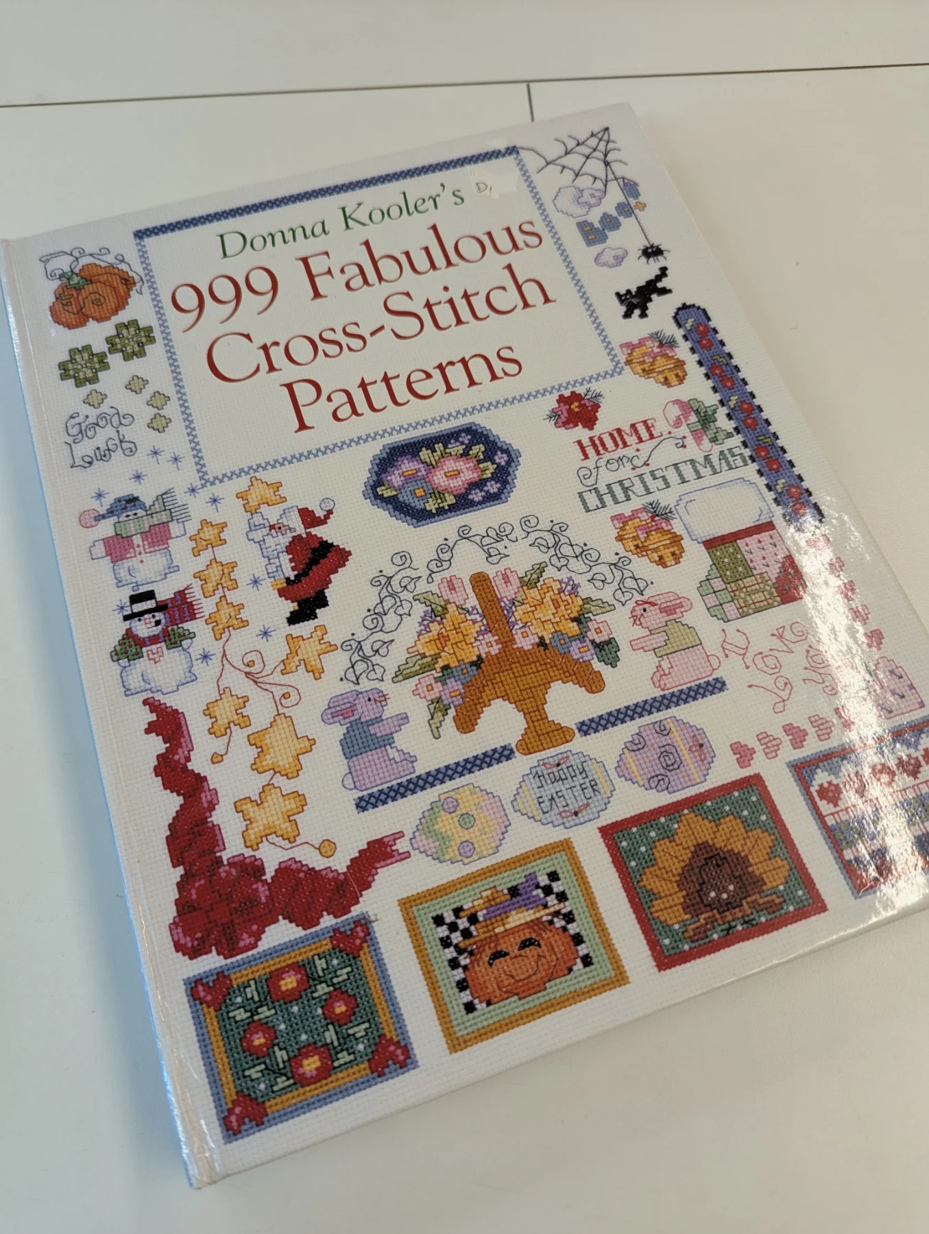 Donna Kooler 999 cross-stitch pattern book, ring bound