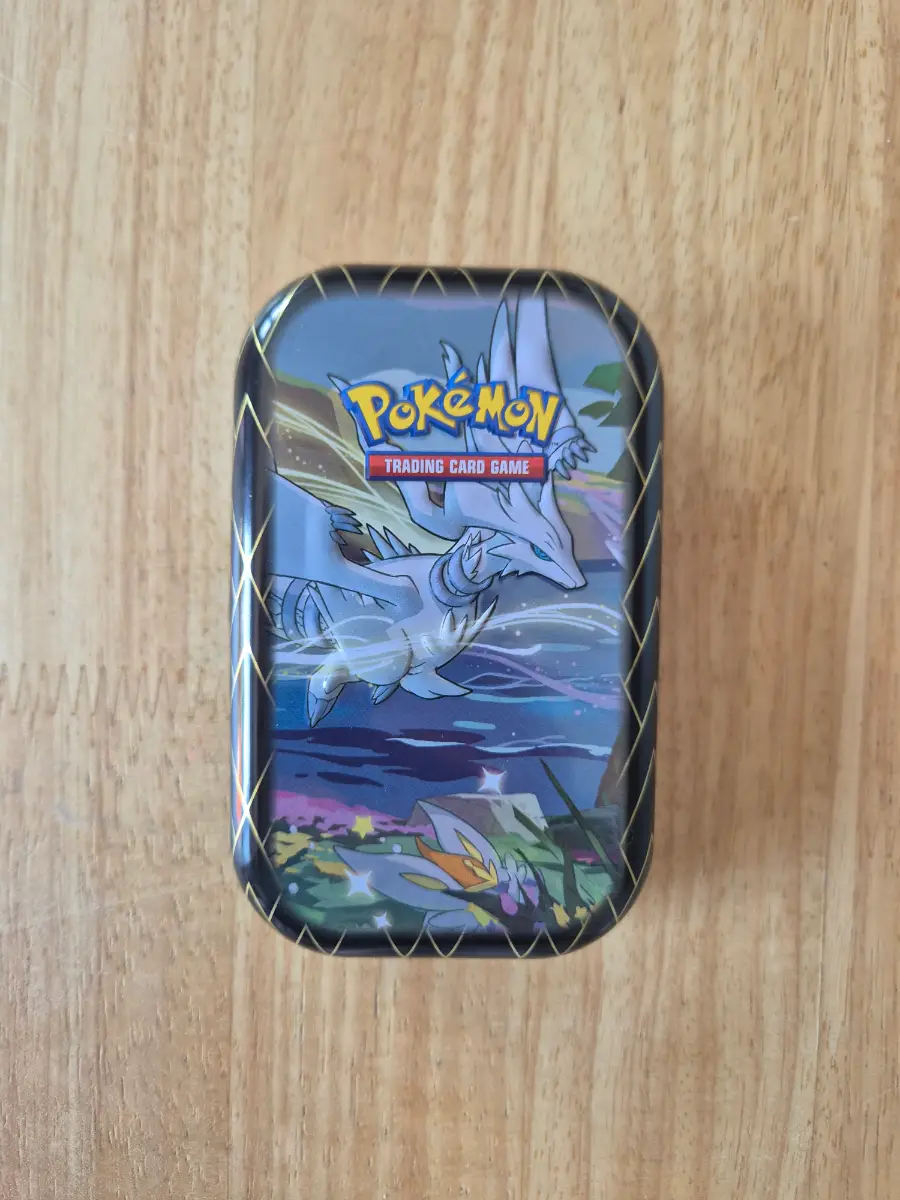 Pokémon cards with tin 50 cards plus 1 EX/V or better