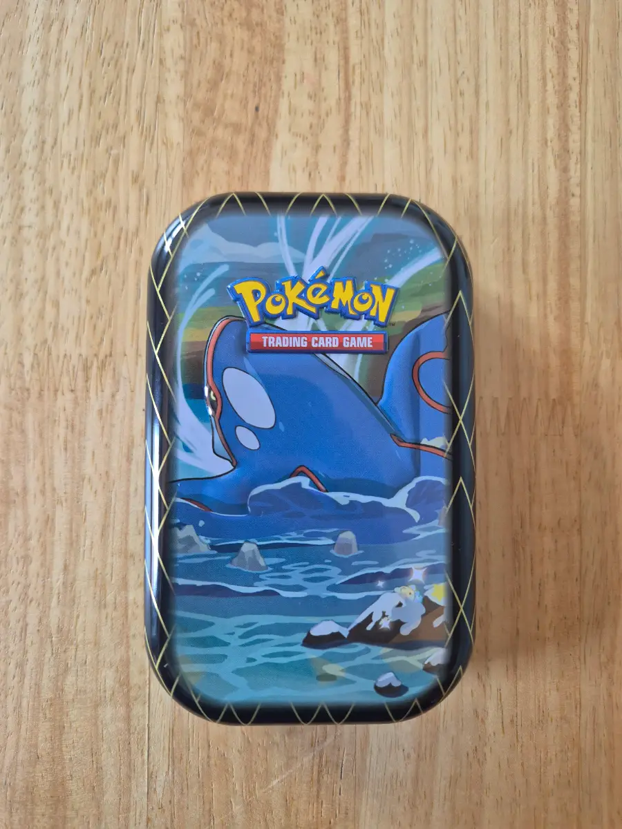 Pokémon 50 card mini tin with EX/V or better