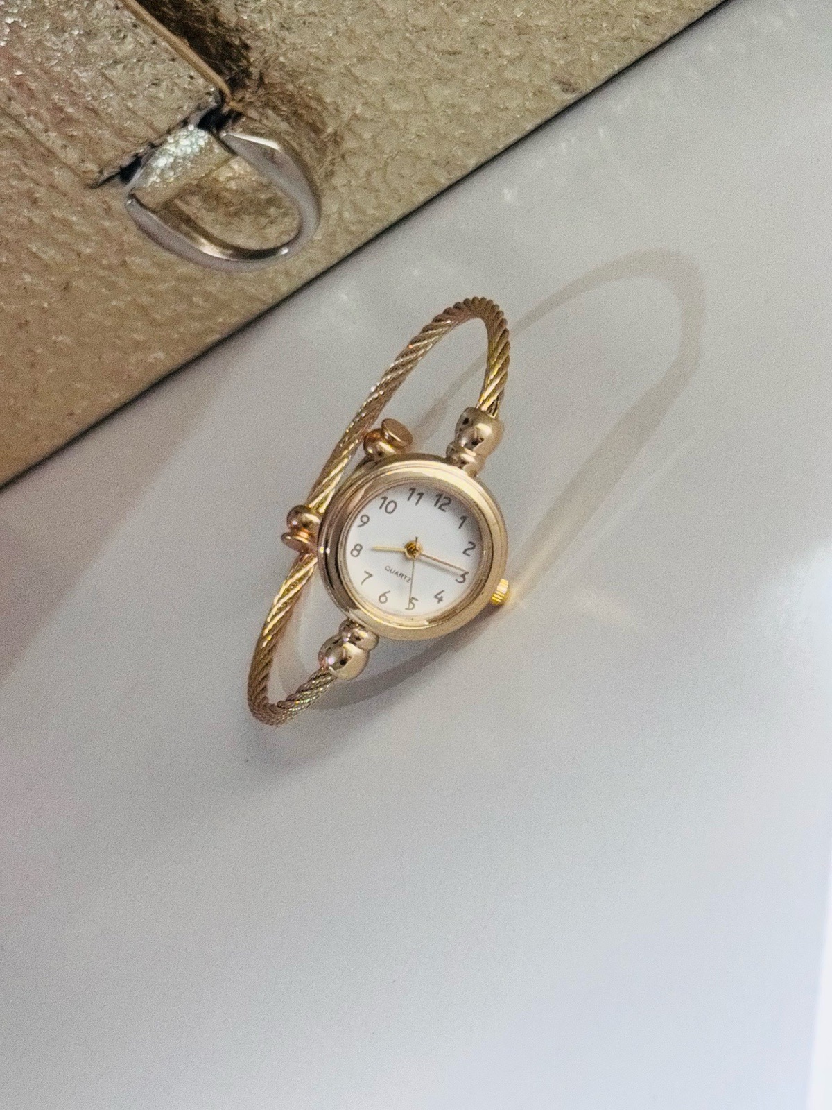 Ladies gold bangle watch