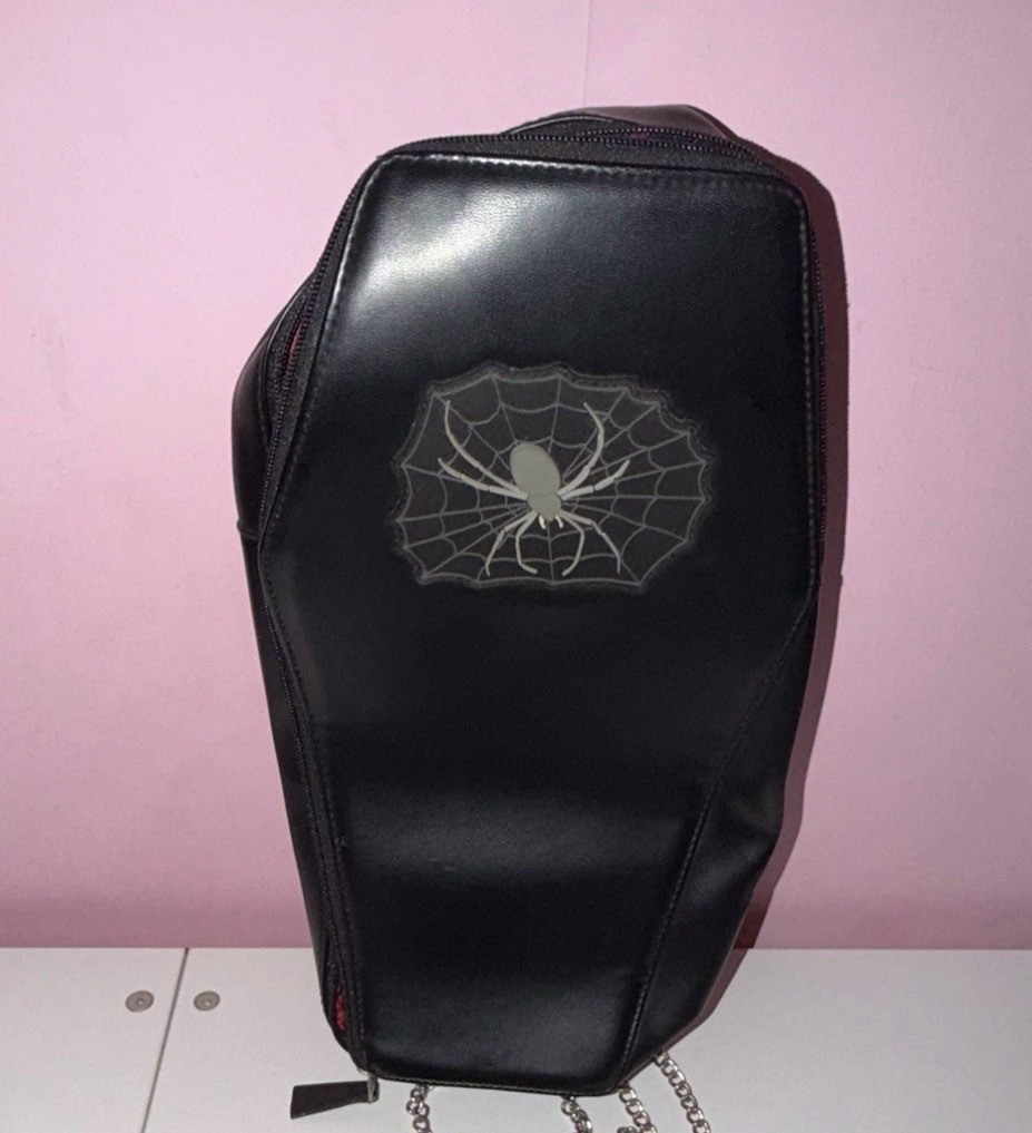Roebuck coffin bag with spider on