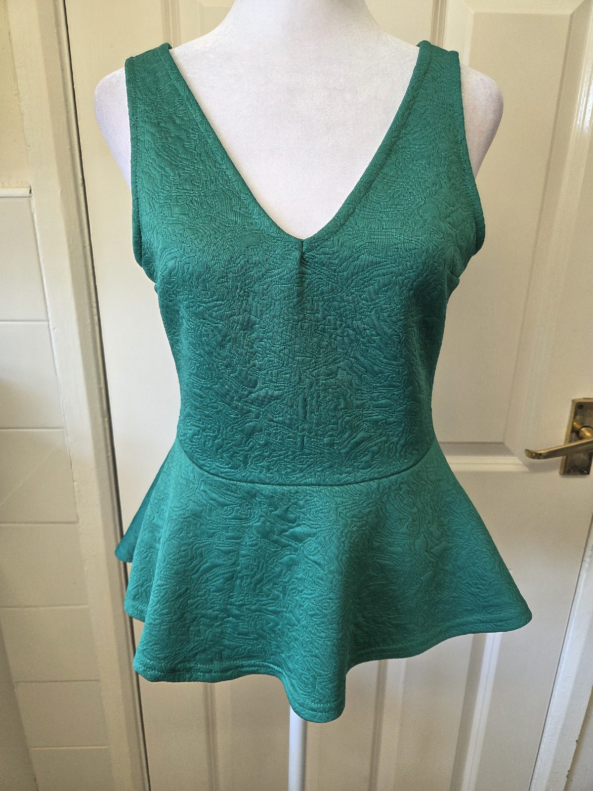 H&M Emerald Green Peplum Top. Size Small