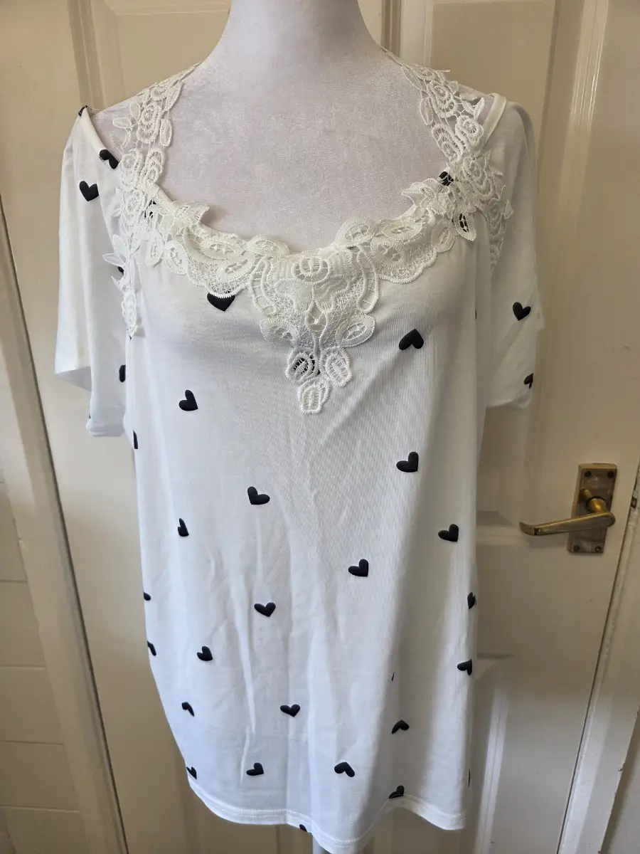 White Heart Print Teeshirt with White Lace Detail Neckline. Size Medium