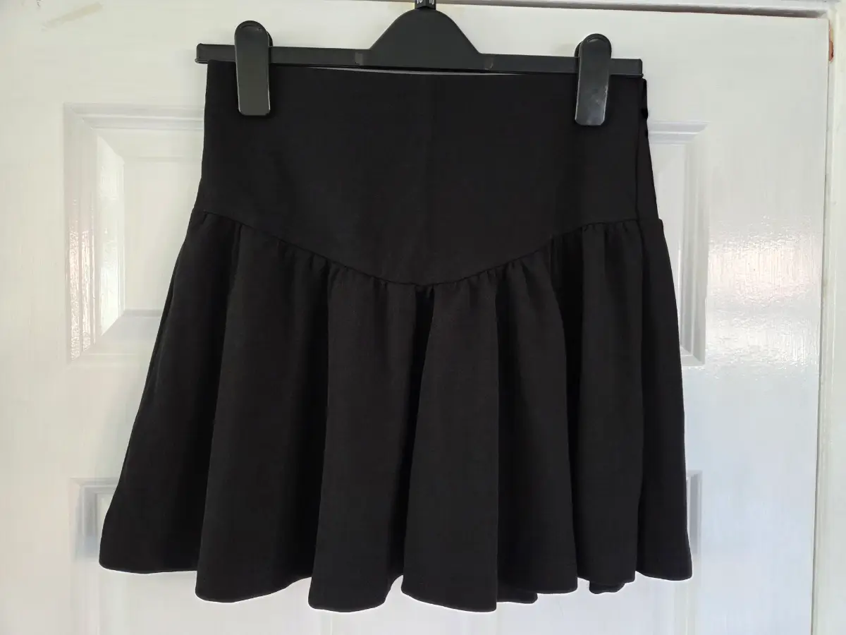 Black Drop-waist Pleated Mini Skirt. Size L (UK12)