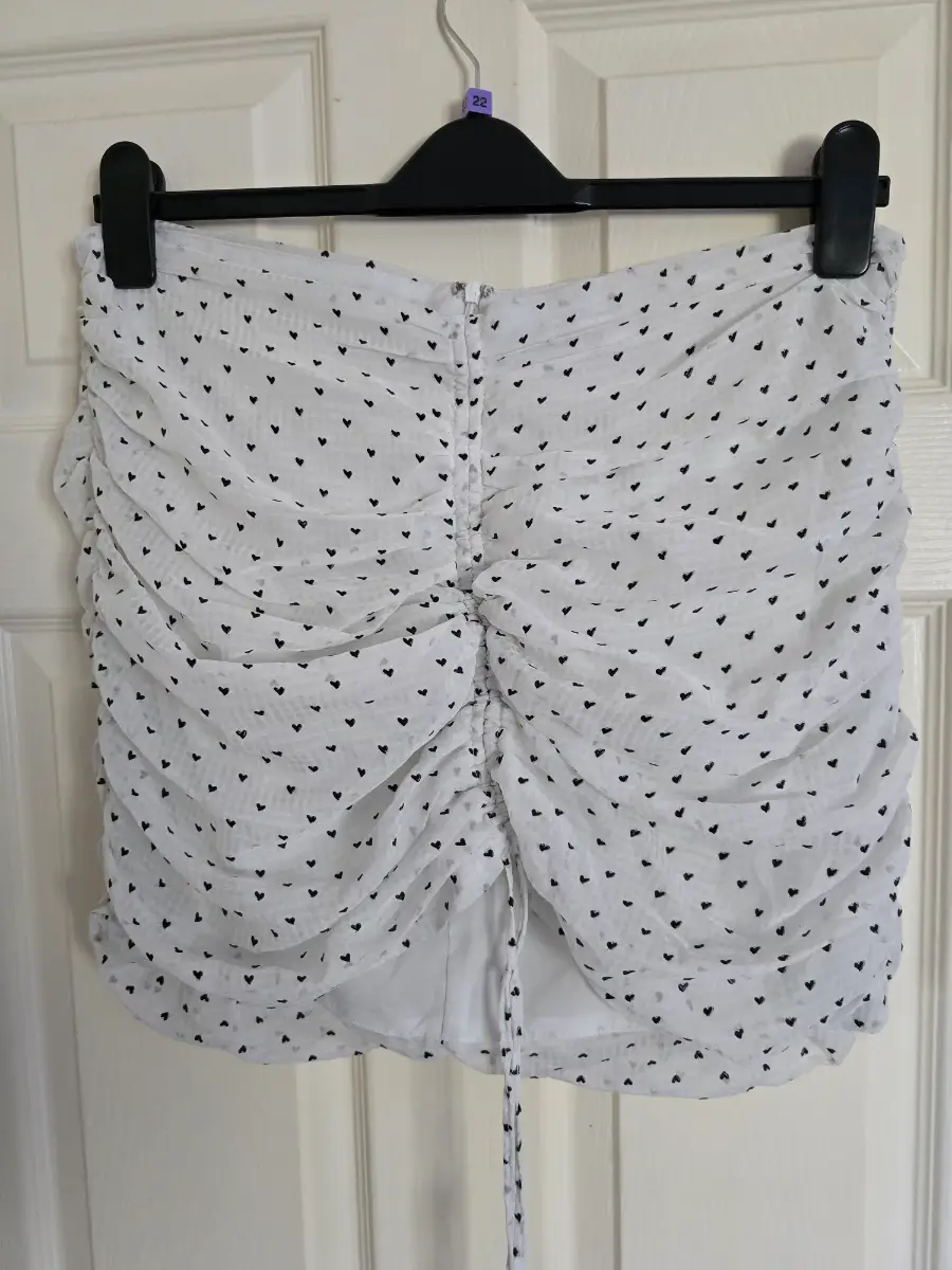 Collective sleeveless top. Size 16. White with little black hearts