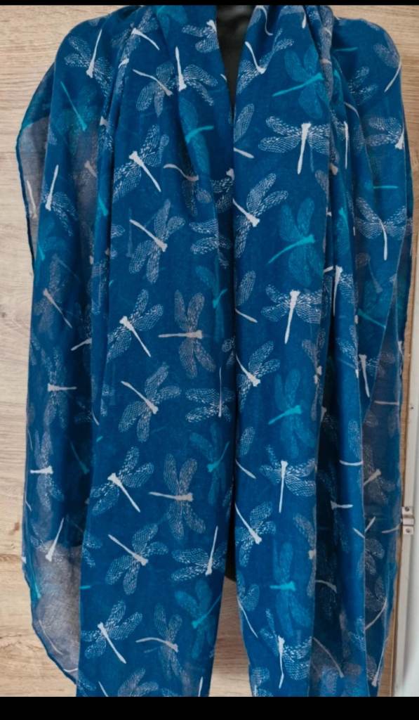 Scarf/Shawl with dragonfly pattern.