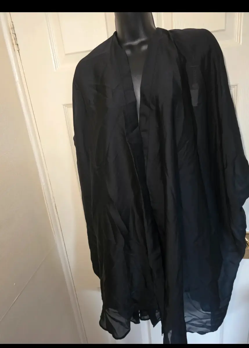 New with tags Dunnes Beach Kaftan. Size small. Black