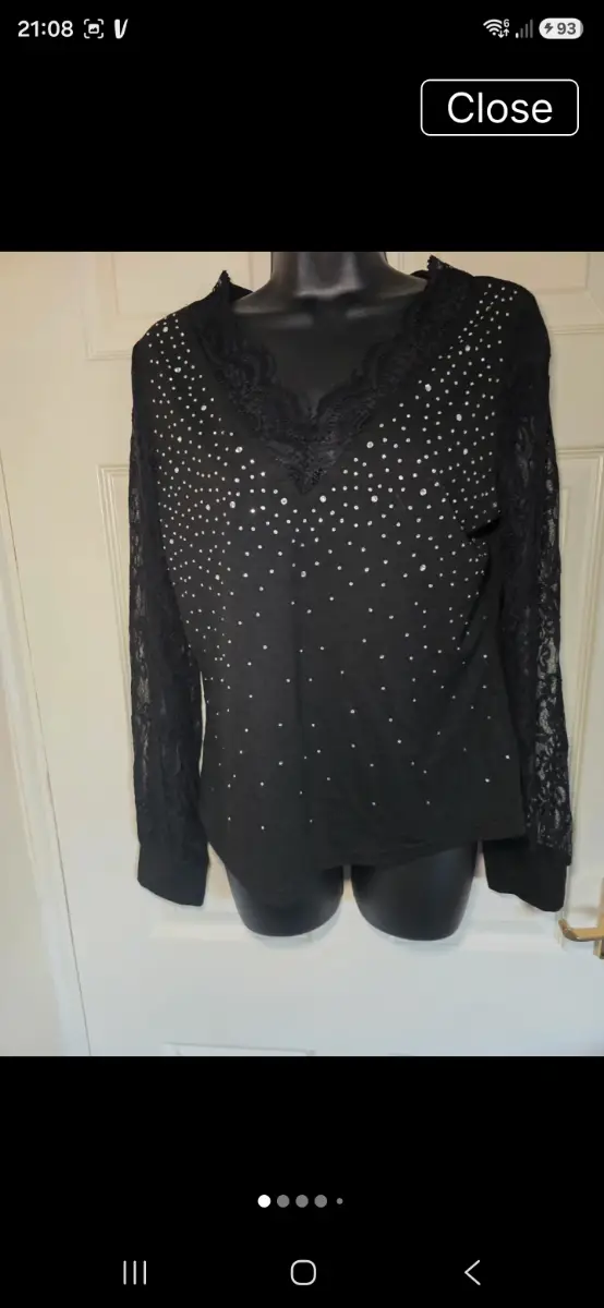 Shein top. Size L. Black with lace arms and silver dots