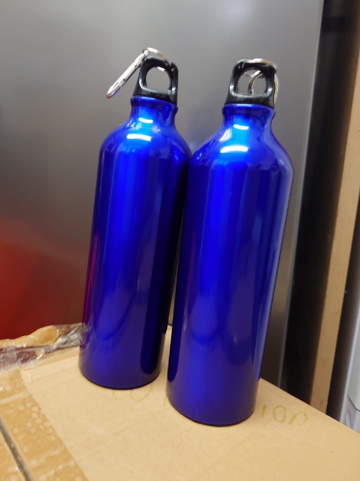 2 x blue aluminium water bottles