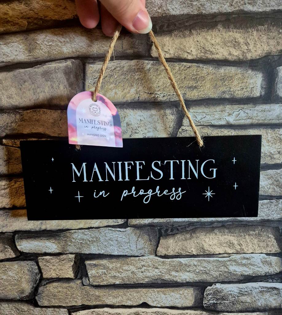 Manifesting in progress sign