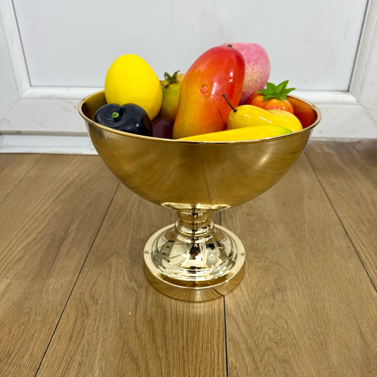 Elegant Metal Pedestal Bowl filled with Assorted Artificial decorative Fruits set.