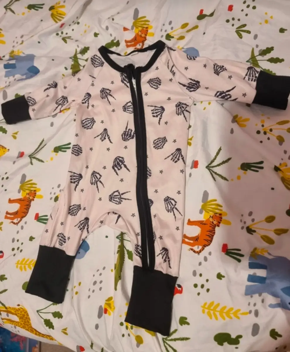 Footless skeleton zip suit