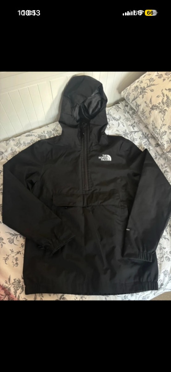 Black North Face 3/4 zip rain coat with hood