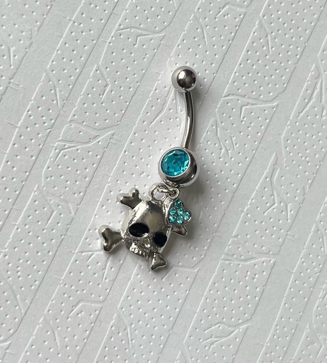 Stainless steel Silver tone blue gem skull belly bar