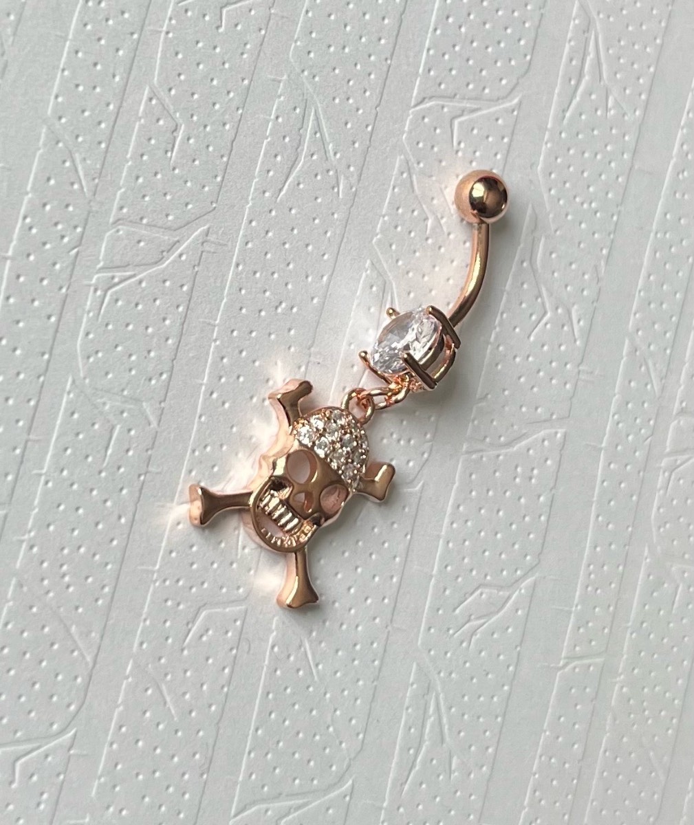 Stainless steel rose gold skull dangly belly bar