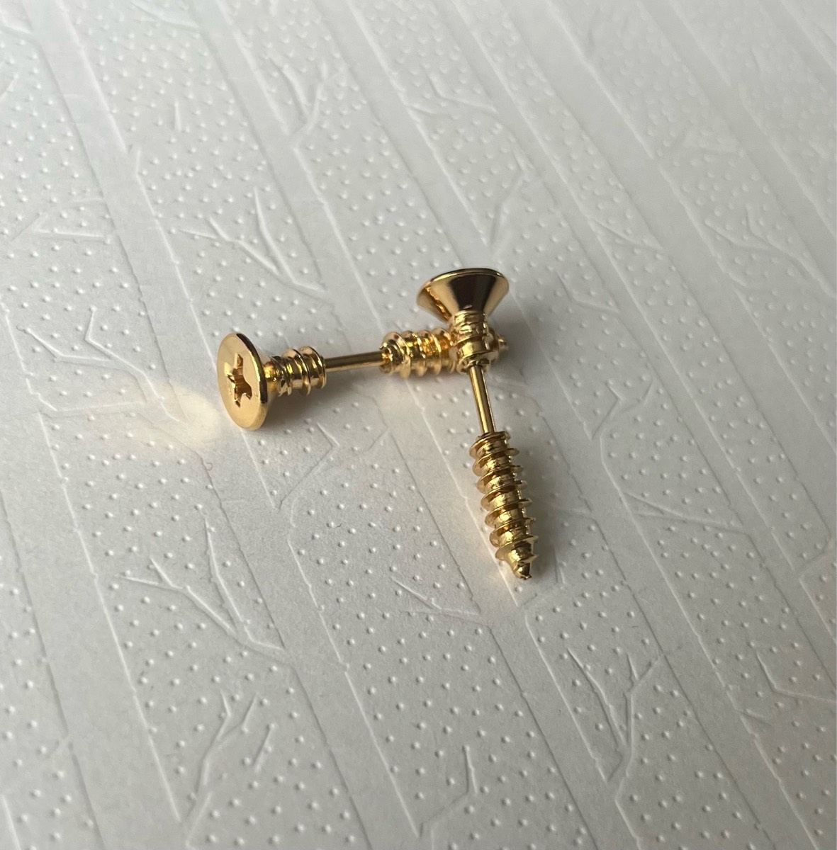 Stainless steel gold tone screw earrings