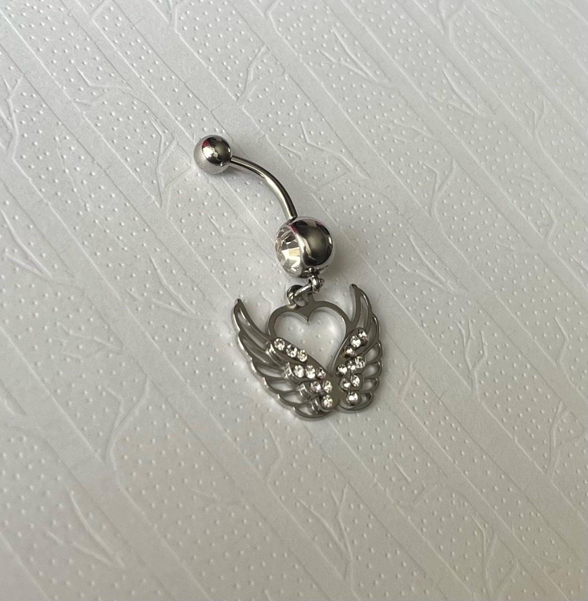 Stainless steel heart and wings dangly belly bar