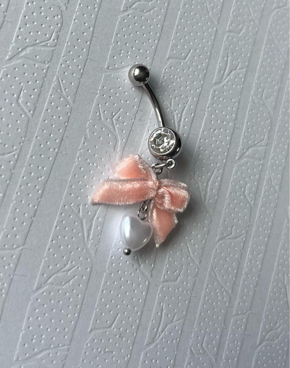 Stainless steel pink bow dangly pearl belly bar