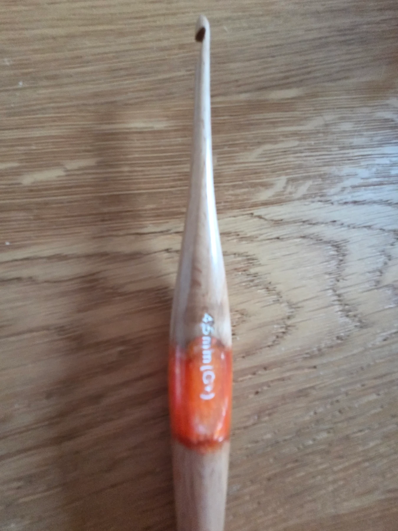 Handcrafted Ommi Ergonomic Crochet Hook smooth wooden shaft vibrant orange resin center grip, 4.5mm
