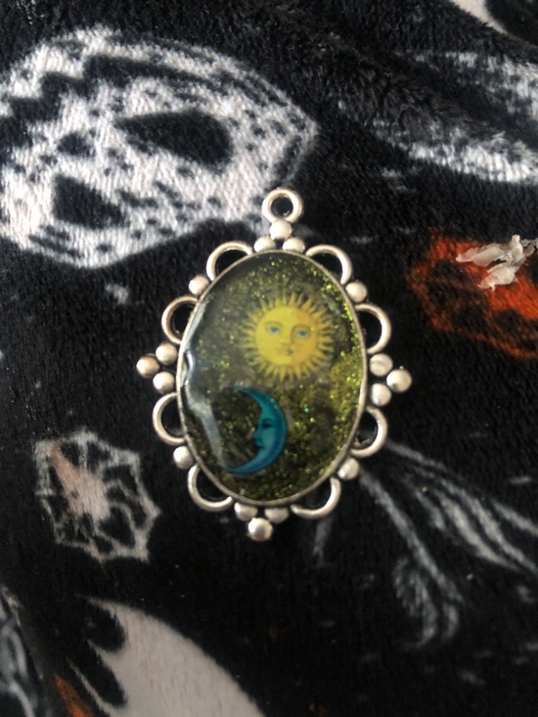 Sun and moon pendant