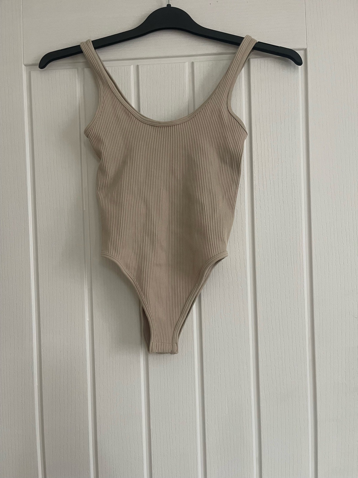 Primark beige bodysuit size 6/8