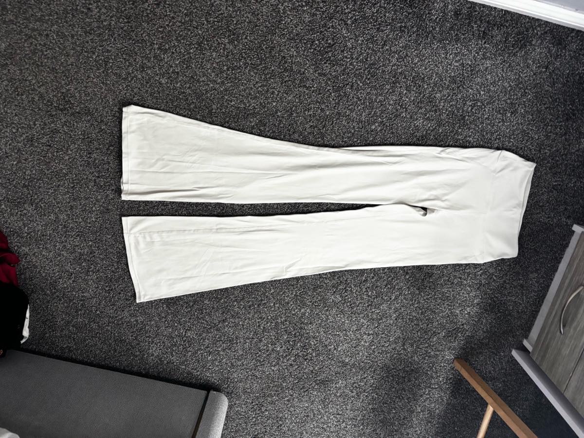 Cream flared leggings