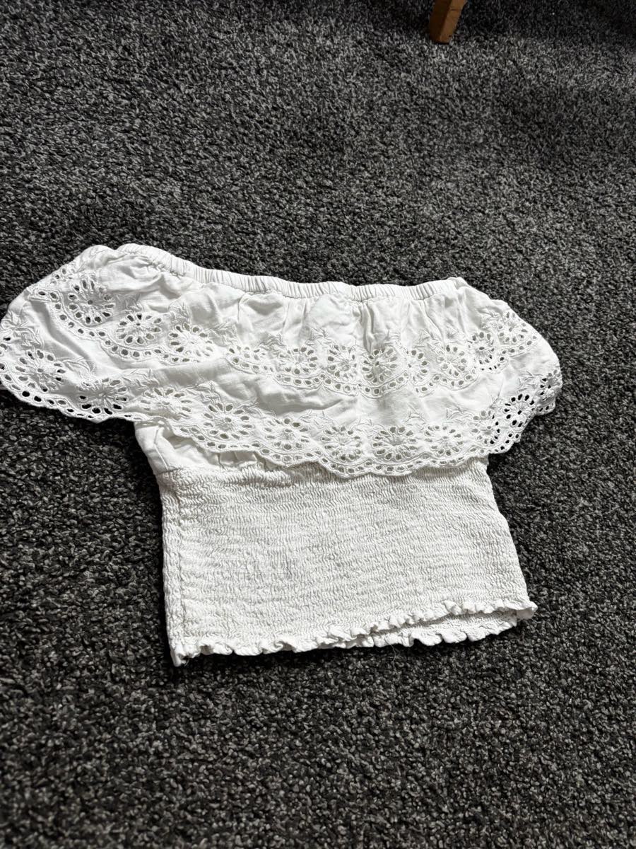 White of the shoulder frilly top