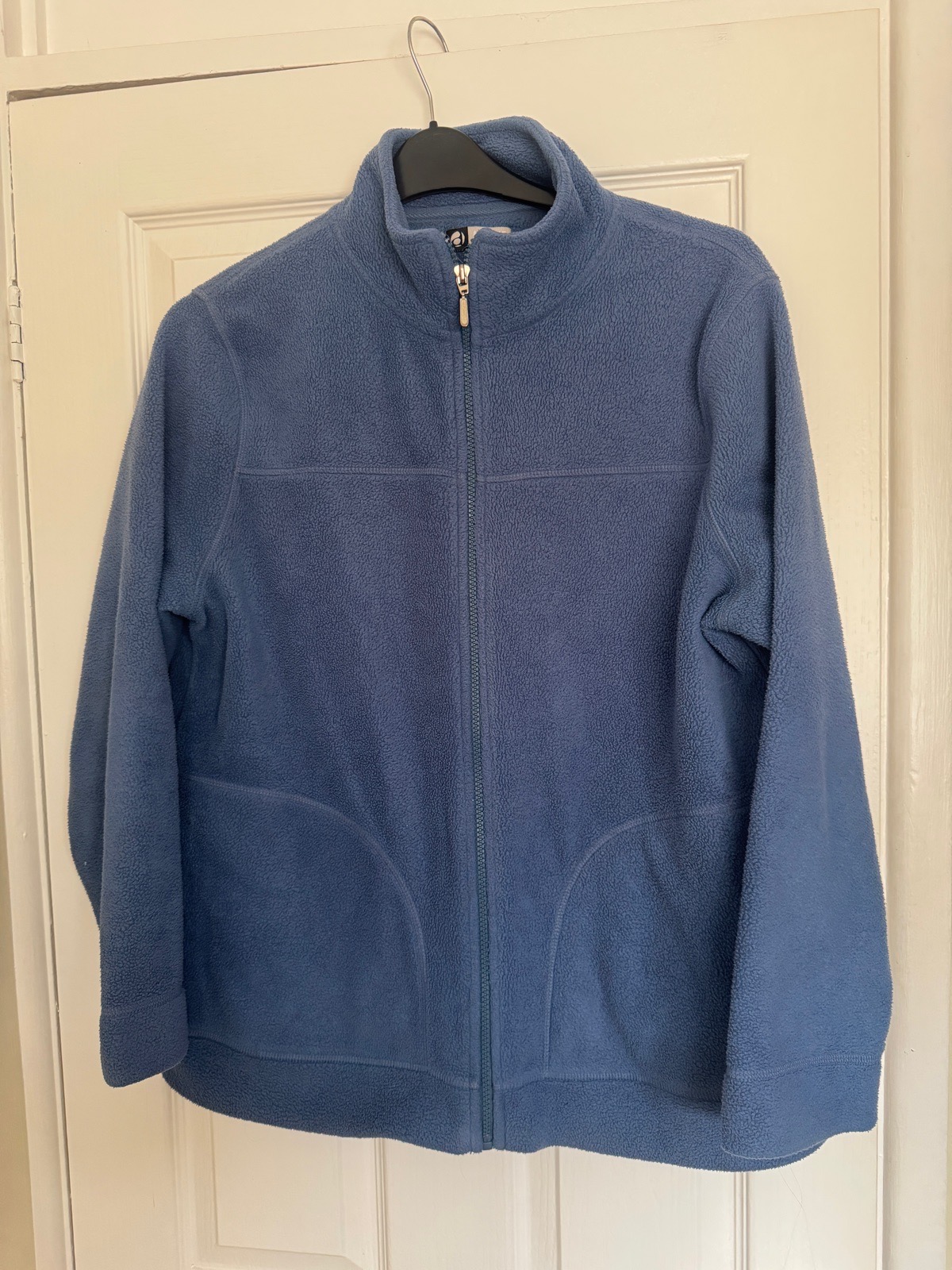 Woman’s blue fleece zip up jacket