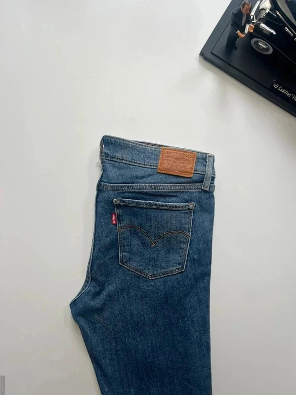 Levi’s premium 711 skinny mid-rise blue ripped women’s stretch raw-hem jeans UK10 W29 L27