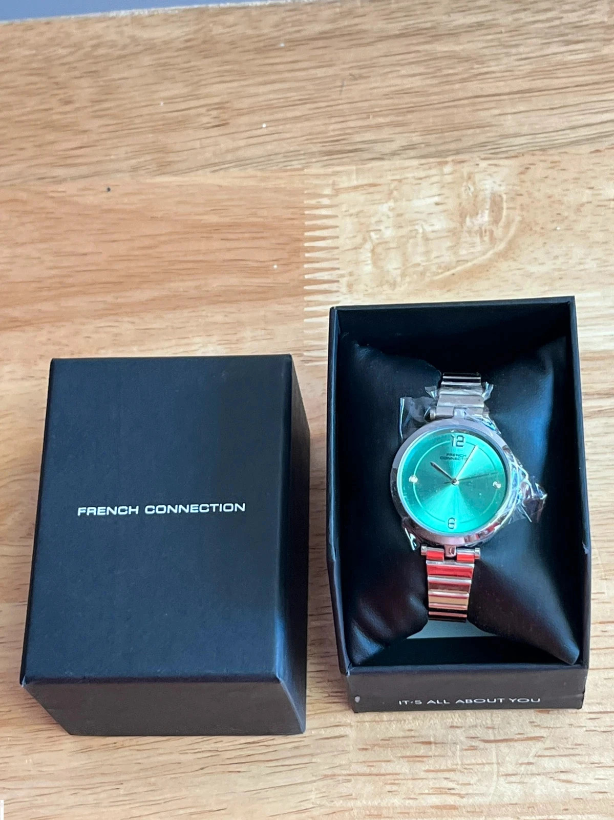 Brand new French connection teal/sea green face women’s watch. 27cm length